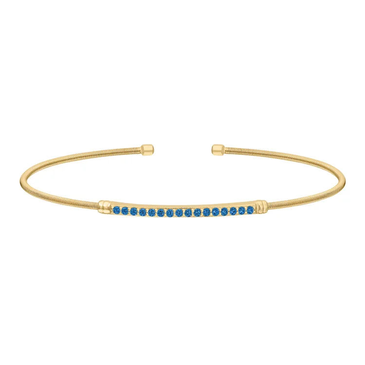 Tennis Bracelets With Gold Links-Gold Finish Sterling Silver Cable Cuff Bracelet with Simulated Blue Zircon Birth Gems - December